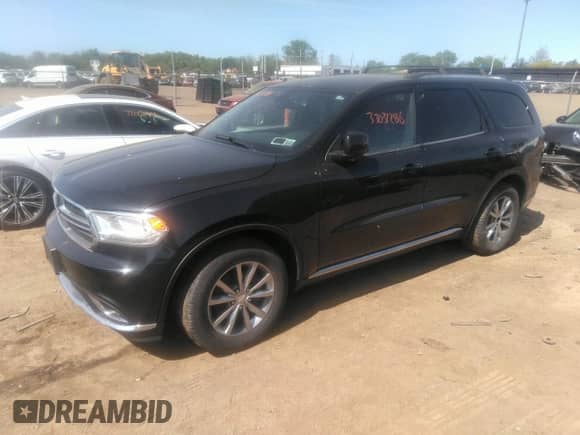 2014 Dodge Durango Limited with VIN 1C4RDHDG2EC402609, listed as a IAAI auction lot 33031286 with 73,700 mi miles and . Bid and sale history available at DreamBid. Image 2.