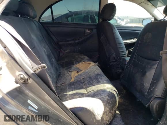 2005 Toyota Corolla CE z VIN 1NXBR32E15Z432228, wystawiony jako Copart lot #55107805 z przebiegiem Nie podano mil oraz Szkoda całkowita • Salvage title. Historia ofert i sprzedaży dostępna na DreamBid. Obrazek 10.