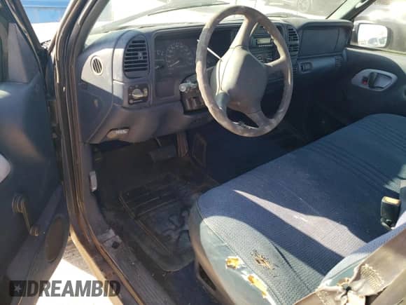 1998 GMC Sierra 1500 z VIN 1GTEC14W2WZ549558, wystawiony jako Copart lot #76294734 z przebiegiem 183 039 mil mil oraz Szkoda całkowita • Salvage title. Historia ofert i sprzedaży dostępna na DreamBid. Obrazek 8.