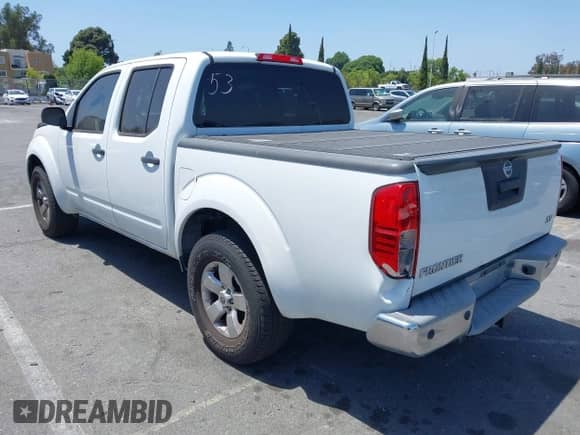 2013 Nissan Frontier SL with VIN 1N6AD0ER3DN734847, listed as a IAAI auction lot 42315412 with 114,471 mi miles and . Bid and sale history available at DreamBid. Image 3.