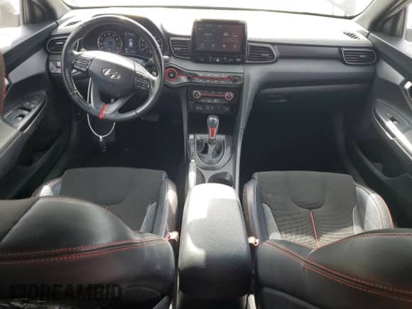 2019 Hyundai Veloster Premium z VIN KMHTG6AF4KU005837, wystawiony jako Copart lot #54165075 z przebiegiem 50 610 mil mil oraz Nie do naprawy • Non repairable. Historia ofert i sprzedaży dostępna na DreamBid. Obrazek 8.