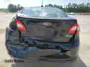 2011 Ford Fiesta SE z VIN 3FADP4BJXBM148155, wystawiony jako Copart lot #81632945 z przebiegiem 236 903 mil mil oraz Szkoda całkowita • Salvage title. Historia ofert i sprzedaży dostępna na DreamBid. Obrazek 6.