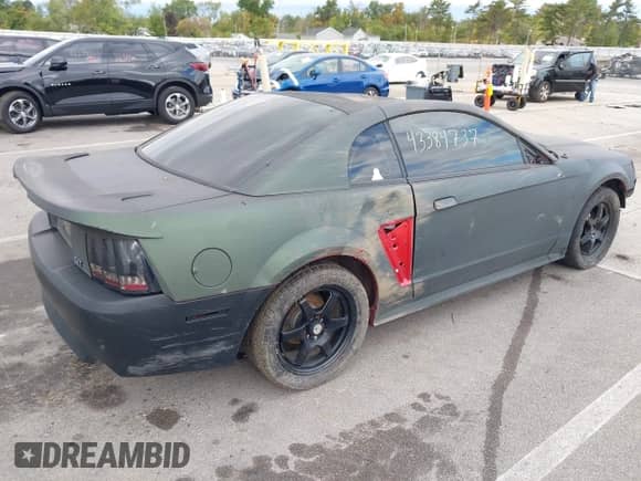 2001 Ford Mustang Standard z VIN 1FAFP40451F225342, wystawiony jako IAAI lot #43384737 z przebiegiem 86 953 mil mil oraz . Historia ofert i sprzedaży dostępna na DreamBid. Obrazek 4.