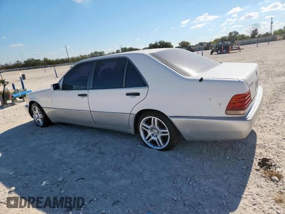 1993 Mercedes-Benz 500 with VIN WDBGA51E6PA096674, listed as a Copart auction lot 82454065 with 155,763 mi miles and Clean title. Bid and sale history available at DreamBid. Image 2.