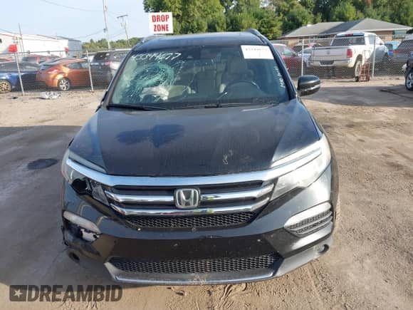 2016 Honda Pilot Touring z VIN 5FNYF6H96GB123286, wystawiony jako IAAI lot #43344677 z przebiegiem 198 495 mil mil oraz . Historia ofert i sprzedaży dostępna na DreamBid. Obrazek 12.