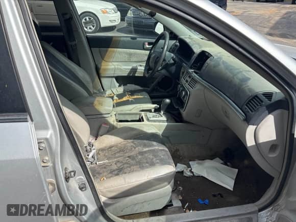 2006 Hyundai Sonata GLS z VIN 5NPEU46F66H062477, wystawiony jako IAAI lot #43346238 z przebiegiem 154 958 mil mil oraz . Historia ofert i sprzedaży dostępna na DreamBid. Obrazek 5.