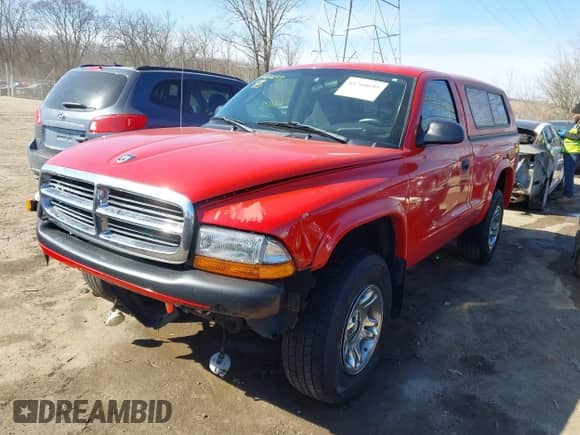 2004 Dodge Dakota with VIN 1D7GG36K04S680034, listed as a IAAI auction lot 41760693 with 166,561 mi miles and . Bid and sale history available at DreamBid. Image 2.
