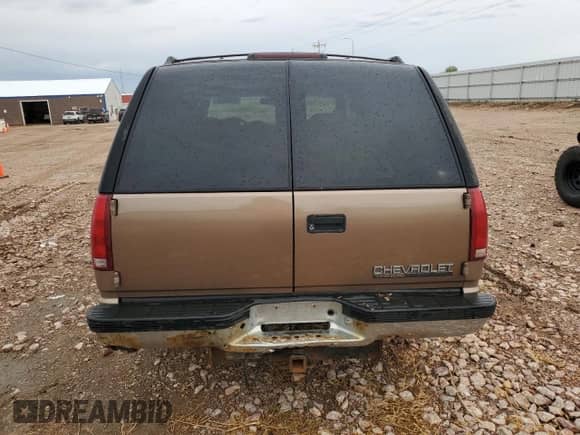 1996 Chevrolet Tahoe с VIN 1GNEK13R5TJ319447, выставлен на аукционе Copart как лот 81334315 с пробегом 298 984 миль миль и Чистый • Clean title. История ставок и продаж доступна на DreamBid. Изображение 6.