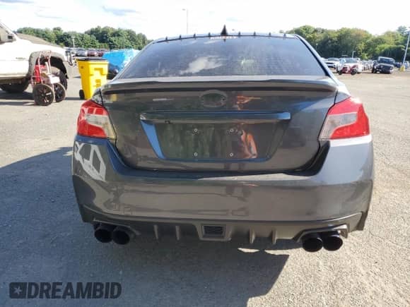 2020 Subaru WRX with VIN JF1VA1A61L9810559, listed as a Copart auction lot 71215395 with 84,597 mi miles and Salvage title. Bid and sale history available at DreamBid. Image 6.
