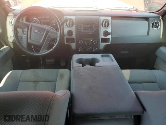 2014 Ford F-150 STX с VIN 1FTEW1CM5EKD41575, выставлен на аукционе Copart как лот 81892565 с пробегом 222 839 миль миль и Списание • Salvage title. История ставок и продаж доступна на DreamBid. Изображение 8.