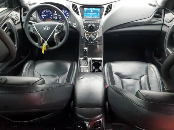 2013 Hyundai Azera z VIN KMHFH4JGXDA329886, wystawiony jako Copart lot #75485654 z przebiegiem 141 865 mil mil oraz Szkoda całkowita • Salvage title. Historia ofert i sprzedaży dostępna na DreamBid. Obrazek 8.