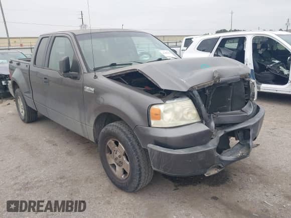 2006 Ford F-150 STX with VIN 1FTRX02WX6KB71470, listed as a IAAI auction lot 41402316 with 168,323 mi miles and . Bid and sale history available at DreamBid. Image 1.