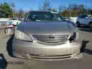 2002 Toyota Camry LE z VIN 4T1BE32K82U588621, wystawiony jako Copart lot #86985085 z przebiegiem 252 745 mil mil oraz Szkoda całkowita • Salvage title. Historia ofert i sprzedaży dostępna na DreamBid. Obrazek 5.