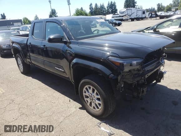 2024 Toyota Tacoma TRD Off Road with VIN 3TMLB5JN1RM085942, listed as a Copart auction lot 64483585 with 1,975 mi miles and Salvage title. Bid and sale history available at DreamBid. Image 4.