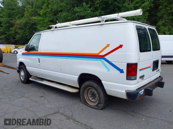 2013 Ford Econoline Cargo Commercial with VIN 1FTNE2EW5DDA16130, listed as a IAAI auction lot 42622530 with 183,090 mi miles and . Bid and sale history available at DreamBid. Image 3.