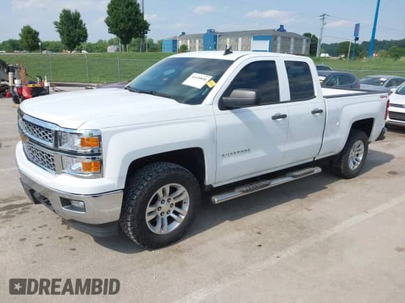 2014 Chevrolet Silverado 1500 LT with VIN 1GCVKREC5EZ412652, listed as a IAAI auction lot 42420856 with 165,891 mi miles and . Bid and sale history available at DreamBid. Image 2.