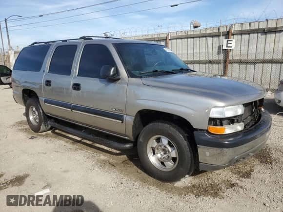 2001 Chevrolet Suburban LT с VIN 3GNEC16T71G125313, выставлен на аукционе Copart как лот 42569695 с пробегом 317 922 миль миль и Списание • Salvage title. История ставок и продаж доступна на DreamBid. Изображение 4.