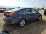 2018 Chevrolet Cruze LT с VIN 1G1BE5SM2J7213380, выставлен на аукционе Copart как лот 80098075 с пробегом 58 139 миль миль и Списание • Salvage title. История ставок и продаж доступна на DreamBid. Изображение 3.
