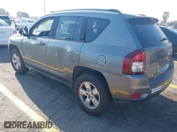 2014 Jeep Compass Sport with VIN 1C4NJCBA0ED552978, listed as a IAAI auction lot 43243438 with 162,597 mi miles and . Bid and sale history available at DreamBid. Image 3.
