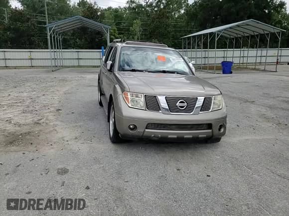 2005 Nissan Pathfinder SE z VIN 5N1AR18U65C747112, wystawiony jako Copart lot #68016305 z przebiegiem 162 033 mil mil oraz Szkoda całkowita • Salvage title. Historia ofert i sprzedaży dostępna na DreamBid. Obrazek 14.