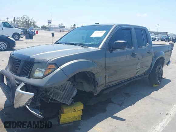 2008 Nissan Frontier SE z VIN 1N6AD07U78C406477, wystawiony jako IAAI lot #42682905 z przebiegiem Nie podano mil oraz . Historia ofert i sprzedaży dostępna na DreamBid. Obrazek 6.