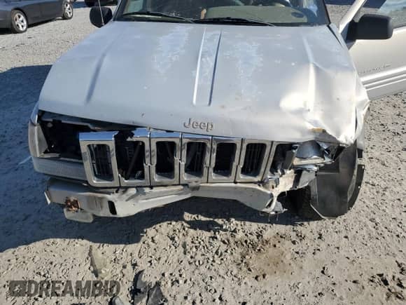 1998 Jeep Grand Cherokee with VIN 1J4GX48Y7WC216585, listed as a Copart auction lot 83532184 with 144,739 mi miles and Salvage title. Bid and sale history available at DreamBid. Image 12.