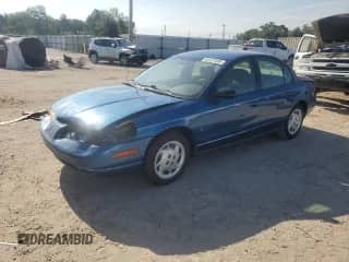 2002 Saturn SL с VIN 1G8ZK52732Z185890, выставлен на аукционе Copart как лот 64127485 с пробегом 176 286 миль миль и Списание • Salvage title. История ставок и продаж доступна на DreamBid. Изображение 1.