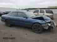 1995 Toyota Camry DX z VIN 4T1SK11EXSU477240, wystawiony jako Copart lot #68422685 z przebiegiem 146 403 mil mil oraz Szkoda całkowita • Salvage title. Historia ofert i sprzedaży dostępna na DreamBid. Obrazek 4.