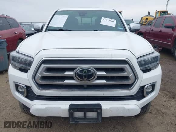2021 Toyota Tacoma Limited with VIN 3TMGZ5AN1MM396485, listed as a IAAI auction lot 41577864 with 60,211 mi miles and . Bid and sale history available at DreamBid. Image 13.