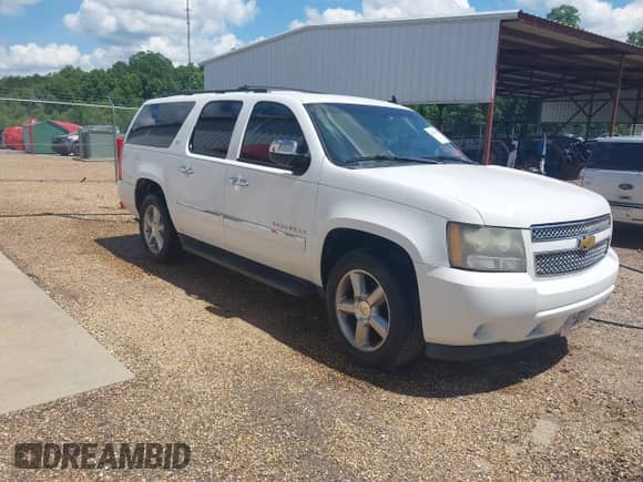 2011 Chevrolet Suburban LTZ with VIN 1GNSKKE37BR348112, listed as a IAAI auction lot 42267962 with 163,558 mi miles and . Bid and sale history available at DreamBid. Image 1.