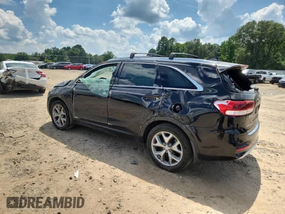 2016 Kia Sorento SXL с VIN 5XYPKDA16GG051658, выставлен на аукционе Copart как лот 66017725 с пробегом 102 880 миль миль и На запчасти • Non repairable. История ставок и продаж доступна на DreamBid. Изображение 2.