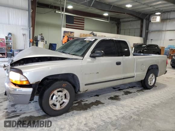 2001 Dodge Dakota с VIN 1B7GL22X01S241896, выставлен на аукционе Copart как лот 80546295 с пробегом 152 001 миль миль и Списание • Salvage title. История ставок и продаж доступна на DreamBid. Изображение 1.