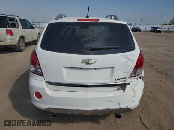 2012 Chevrolet Captiva Sport LTZ с VIN 3GNFL4E5XCS588975, выставлен на аукционе Copart как лот 81112095 с пробегом 150 420 миль миль и Чистый • Clean title. История ставок и продаж доступна на DreamBid. Изображение 6.