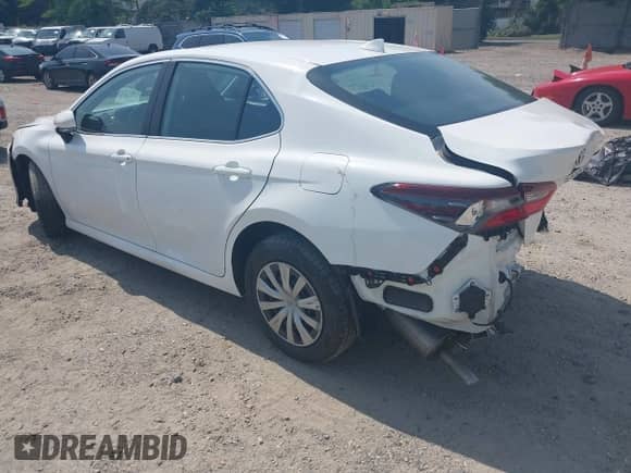 2022 Toyota Camry Hybrid LE with VIN 4T1C31AK2NU591549, listed as a IAAI auction lot 42499072 with 55,882 mi miles and . Bid and sale history available at DreamBid. Image 3.