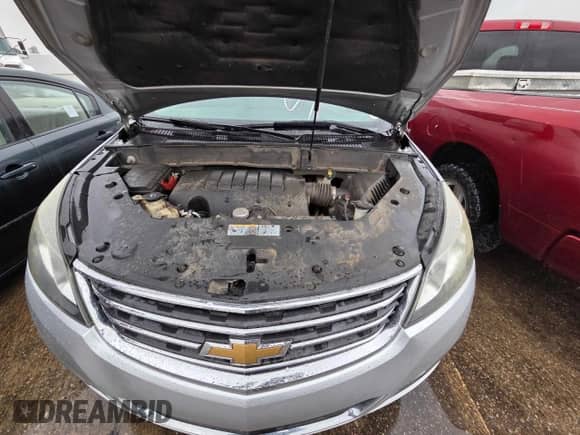 2016 Chevrolet Traverse LT z VIN 1GNKRHKD1GJ163328, wystawiony jako Copart lot #90302555 z przebiegiem 154 702 mil mil oraz Czysty tytuł • Clean title. Historia ofert i sprzedaży dostępna na DreamBid. Obrazek 7.