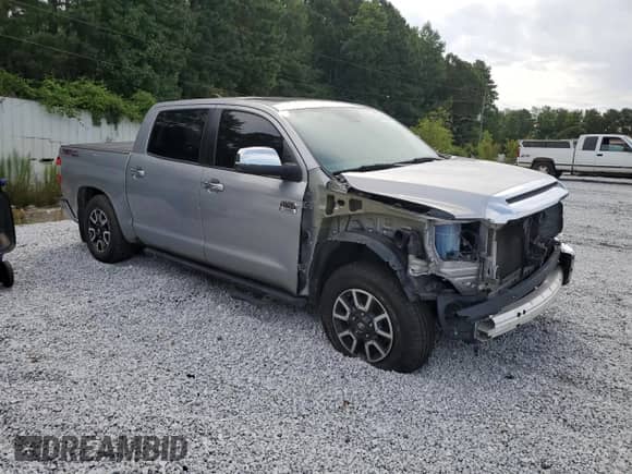 2020 Toyota Tundra Platinum с VIN 5TFGY5F17LX263151, выставлен на аукционе Copart как лот 65772464 с пробегом 104 218 миль миль и Списание • Salvage title. История ставок и продаж доступна на DreamBid. Изображение 4.