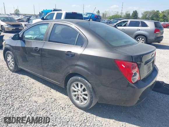2013 Chevrolet Sonic LS with VIN 1G1JA5SHXD4220982, listed as a IAAI auction lot 43333199 with 167,209 mi miles and . Bid and sale history available at DreamBid. Image 3.