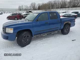 2008 Dodge Dakota Laramie with VIN 1D7HW58N68S637012, listed as a Copart auction lot 45932835 with 152,146 mi miles and Clean title. Bid and sale history available at DreamBid. Image 1.