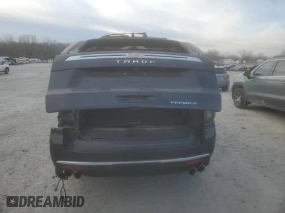 2023 Chevrolet Tahoe Premier with VIN 1GNSCSKD4PR563710, listed as a Copart auction lot 84965394 with 17,528 mi miles and Salvage title. Bid and sale history available at DreamBid. Image 6.