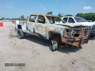 2015 Chevrolet Silverado 2500HD Work Truck z VIN 1GC1KUEG0FF156704, wystawiony jako IAAI lot #42683155 z przebiegiem Nie podano mil oraz . Historia ofert i sprzedaży dostępna na DreamBid. Obrazek 1.