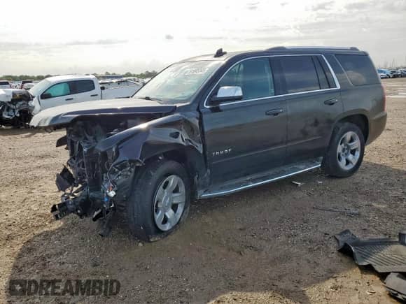 2017 Chevrolet Tahoe Premier with VIN 1GNSCCKC3HR219574, listed as a Copart auction lot 61045345 with 124,927 mi miles and Salvage title. Bid and sale history available at DreamBid. Image 1.