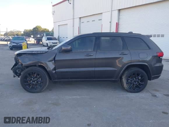 2021 Jeep Grand Cherokee Laredo E with VIN 1C4RJEAG3MC681031, listed as a IAAI auction lot 40734451 with 47,147 mi miles and . Bid and sale history available at DreamBid. Image 13.