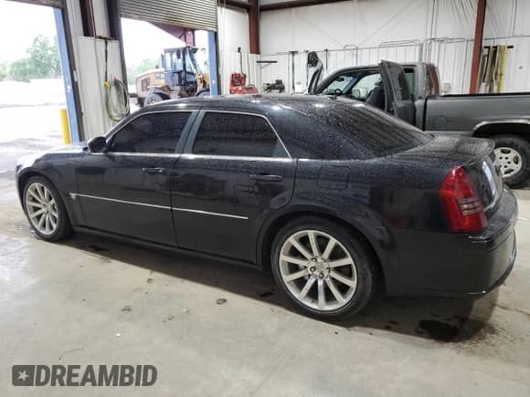 2006 Chrysler 300 C SRT-8 z VIN 2C3LA73W26H242915, wystawiony jako Copart lot #56929214 z przebiegiem 190 677 mil mil oraz Czysty tytuł • Clean title. Historia ofert i sprzedaży dostępna na DreamBid. Obrazek 2.