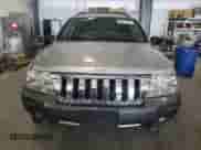 2004 Jeep Grand Cherokee Laredo with VIN 1J4GW48J64C279213, listed as a Copart auction lot 69077445 with 170,595 mi miles and Salvage title. Bid and sale history available at DreamBid. Image 5.