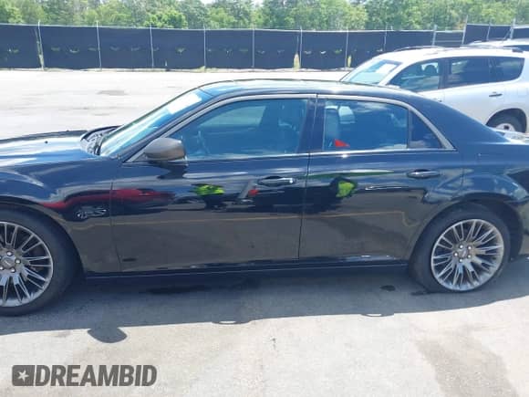 2013 Chrysler 300 C John Varvatos Limited Edition with VIN 2C3CCADT1DH744906, listed as a IAAI auction lot 42145934 with 136,872 mi miles and . Bid and sale history available at DreamBid. Image 15.