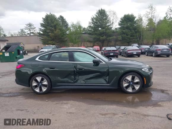 2024 BMW i4 eDrive40 with VIN WBY73AW07RFS54641, listed as a IAAI auction lot 42187165 with 5,376 mi miles and . Bid and sale history available at DreamBid. Image 13.