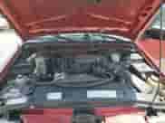 2000 Chevrolet Blazer LT with VIN 1GNCS13W9Y2393839, listed as a Copart auction lot 64441585 with 211,917 mi miles and Salvage title. Bid and sale history available at DreamBid. Image 12.