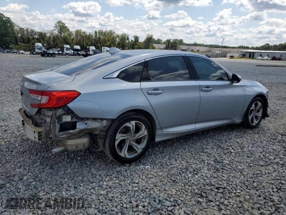 2018 Honda Accord EX-L с VIN 1HGCV1F52JA106499, выставлен на аукционе Copart как лот 80058555 с пробегом 85 984 миль миль и Списание • Salvage title. История ставок и продаж доступна на DreamBid. Изображение 3.