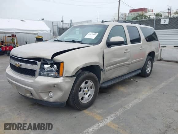2009 Chevrolet Suburban 2LT z VIN 1GNFC26J19R203458, wystawiony jako IAAI lot #42472007 z przebiegiem 96 113 mil mil oraz . Historia ofert i sprzedaży dostępna na DreamBid. Obrazek 17.