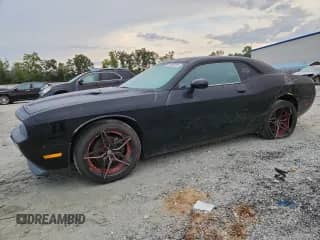 2014 Dodge Challenger SXT z VIN 2C3CDYAG9EH195244, wystawiony jako Copart lot #70169705 z przebiegiem 98 728 mil mil oraz Szkoda całkowita • Salvage title. Historia ofert i sprzedaży dostępna na DreamBid. Obrazek 1.